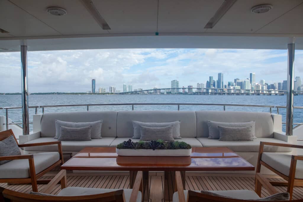 Closer look at looking out onto the Aft Deck with the Miami Beach City Skyline in the background.
